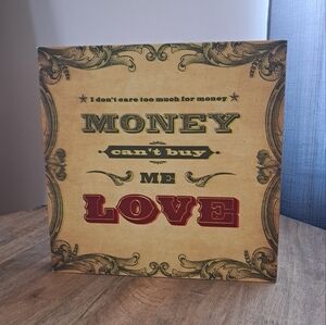 Wall Wooden Decor Sign with Quote "Money Can't Buy Me Love"